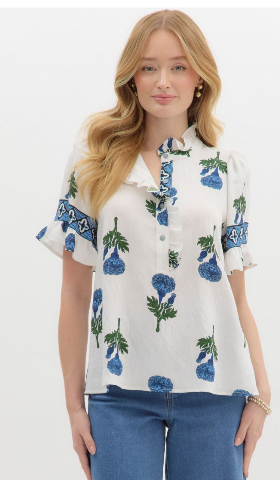 White ruffle top with blue flowers