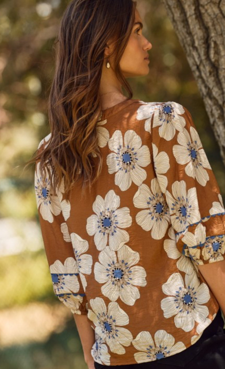 Brown floral top trimmed in blue