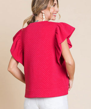 Cranberry knit textured top with ruffled sleeves