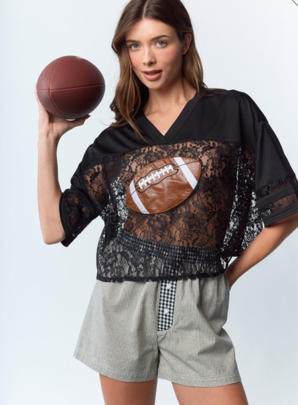 Football and lace top, cropped