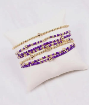 Purple and gold beaded bracelet