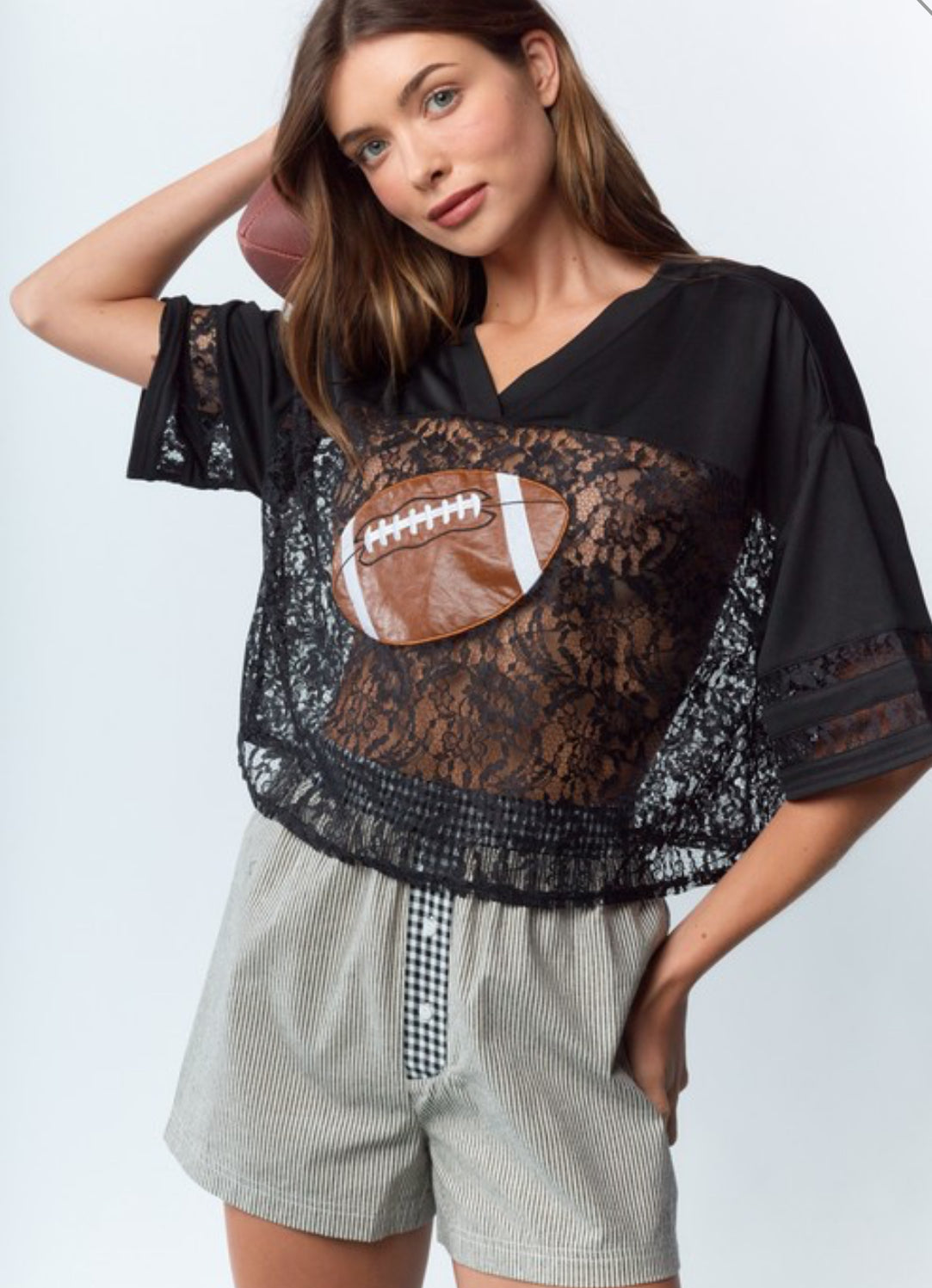 Football and lace top, cropped