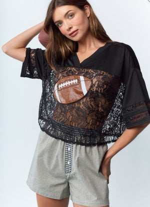 Football and lace top, cropped