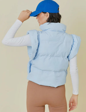 Baby blue puffer vest with bow detail w/ zipper and pockets