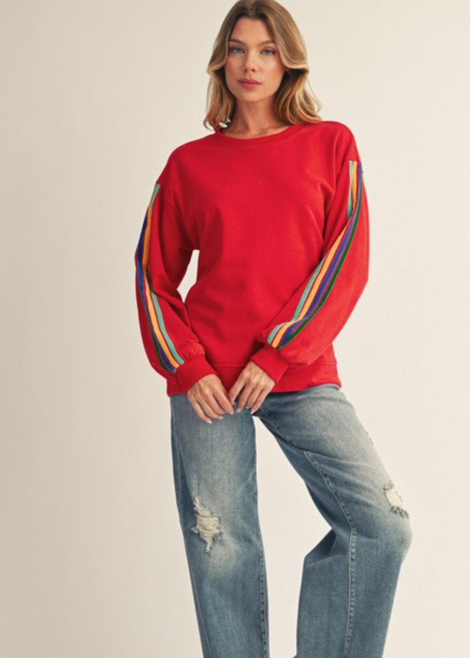 Red pullover w/velvet accent tape on the sleeve