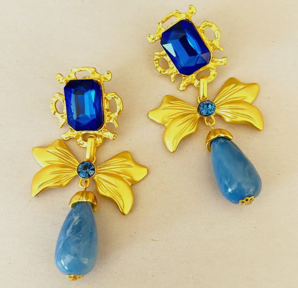 BC Blue rhinestone bow earrings