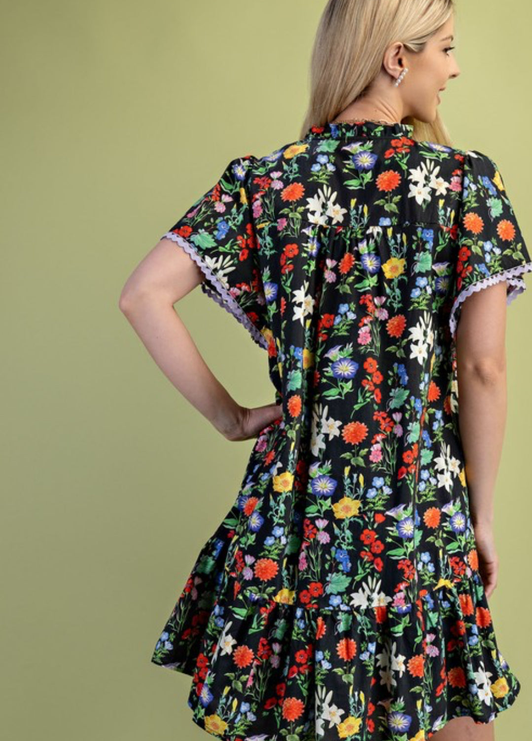 Black floral dress trimmed in lilac ric rac(lined)