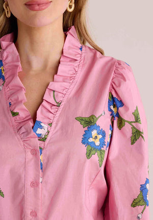 Pink ruffle top with smocked wrist bands