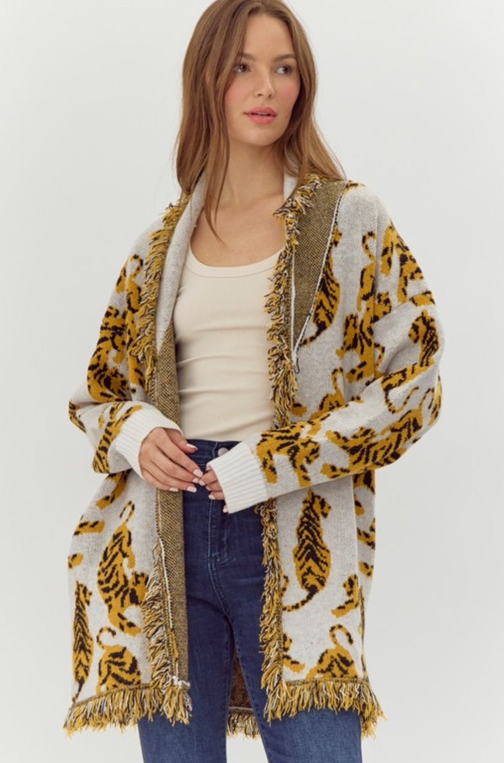 Tiger print cardigan with long sleeves and drop shoulders and fringe detail