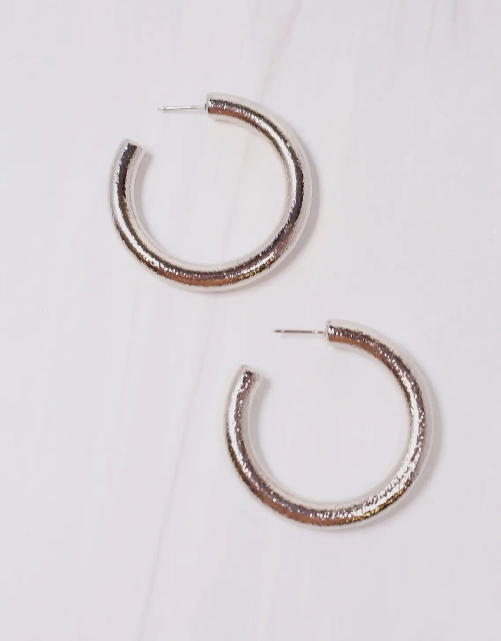 Silver Cusick hoop earrings