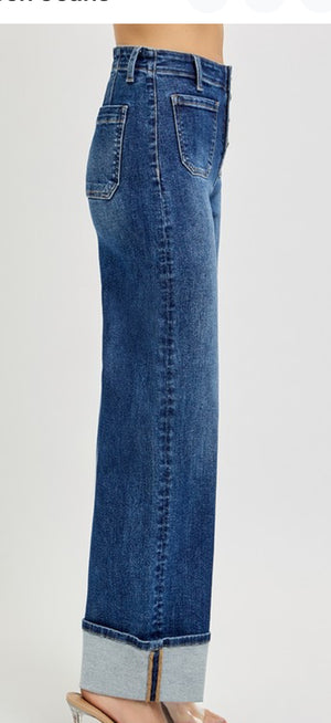 High rise, button down denim jeans with front patch pocket wide ankle cuffed